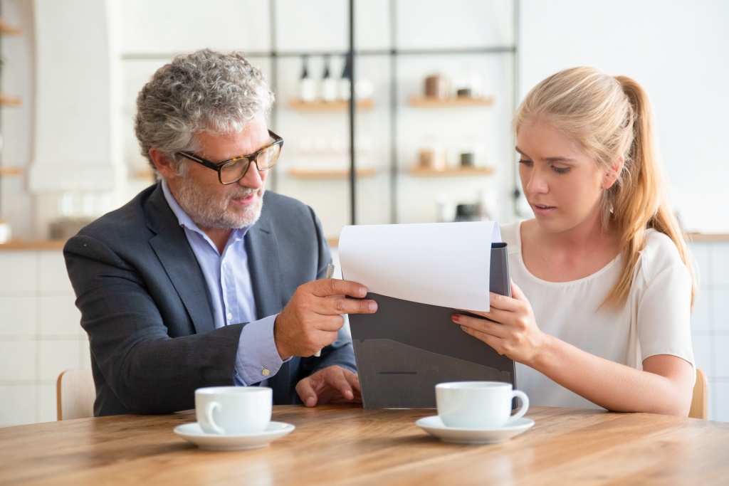 mature-legal-advisor-reading-document-explaining-details-young-customer.jpg чашки